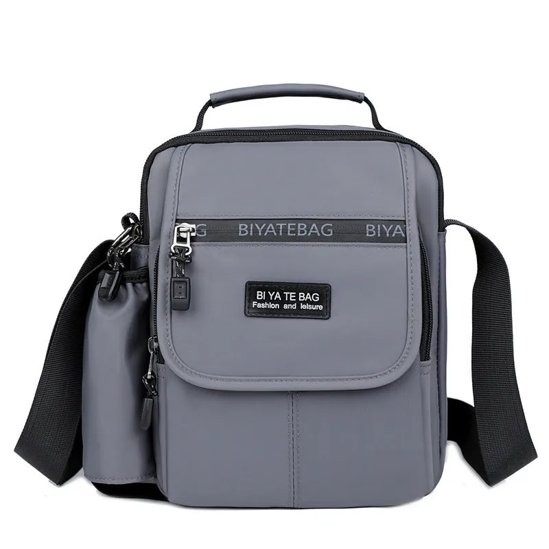 XIANGTUIBAO New Shoulder Bag Men's Oxford Cloth Messenger Bag Men's Business Outdoor Casual Vertical and Portable Design Small Bag Men's Water Cup Bag