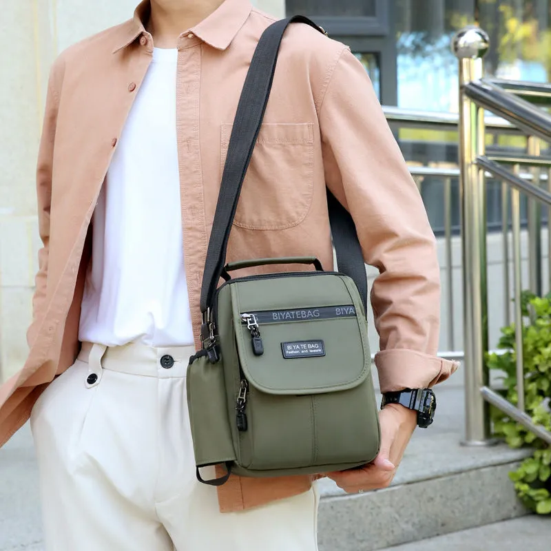 XIANGTUIBAO New Shoulder Bag Men's Oxford Cloth Messenger Bag Men's Business Outdoor Casual Vertical and Portable Design Small Bag Men's Water Cup Bag
